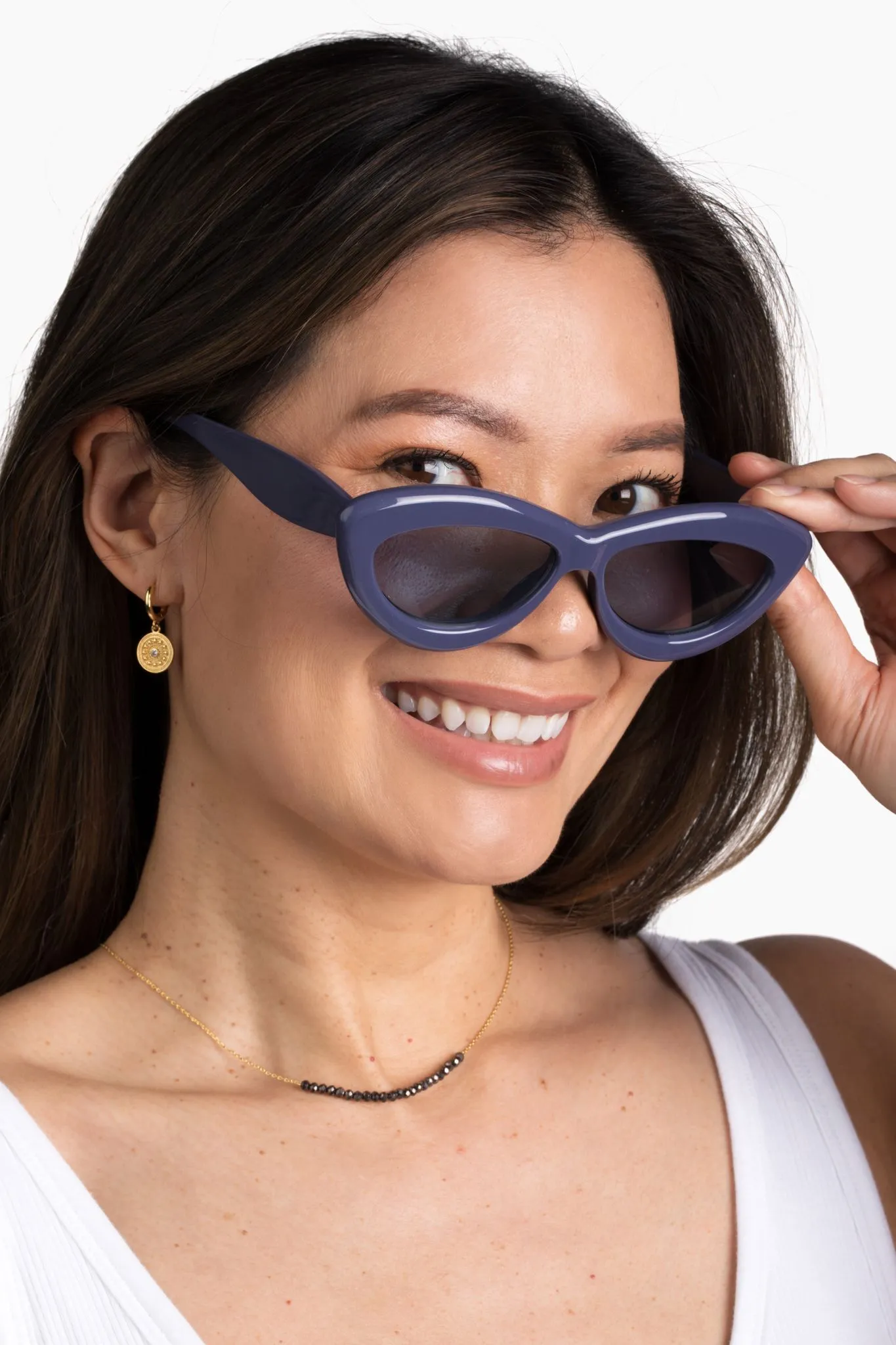 women wearing necklace